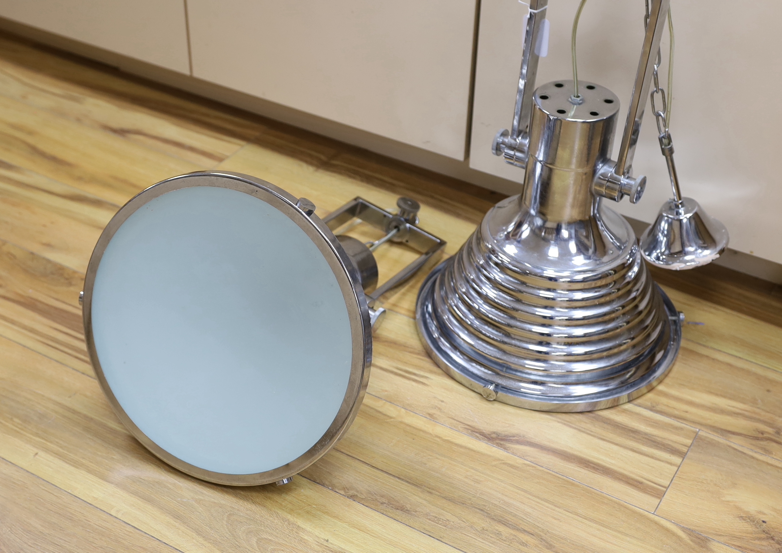 A large pair of chrome industrial hanging pendant lights, 102 including chain high